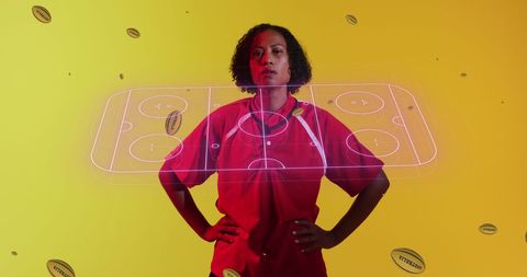 Confident female rugby player with futuristic sports overlay