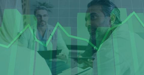 Executives Analyzing Financial Charts in Business Meeting