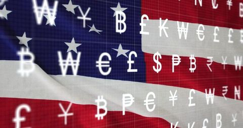 Currency symbols overlaid on american flag representing global finance