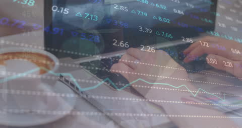 Digital Overlay of Financial Data with Person Using Laptop