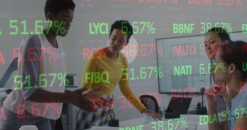 Female Coworkers Collaborating Amidst Financial Data Overlay - Download Free Stock Images Pikwizard.com