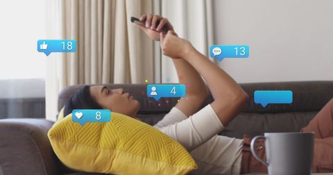 Relaxing Woman Engaging with Social Media on Smartphone