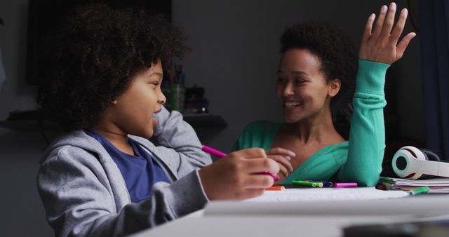 Mother and Son Doing Homework Together Indoors - Download Free Stock Images Pikwizard.com