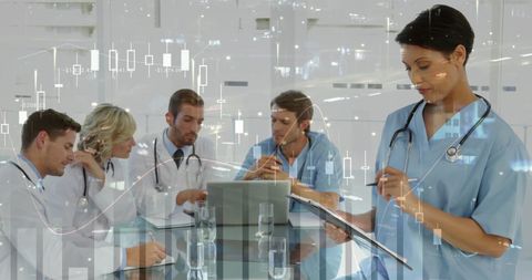 Healthcare Professionals Analyzing Digital Data in Modern Hospital