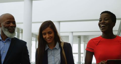 Diverse Professionals Engaged in Cheerful Conversation
