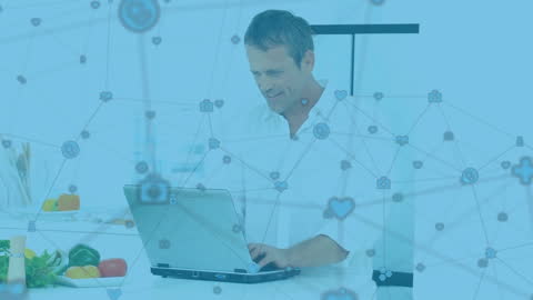 Man Using Laptop with Global Network Animation
