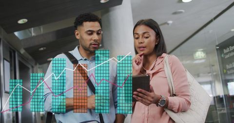 Diverse Business Colleagues Analyzing Financial Data Charts