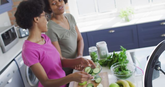 Mother and Daughter Preparing Healthy Meal in Bright Modern Kitchen - Download Free Stock Images Pikwizard.com