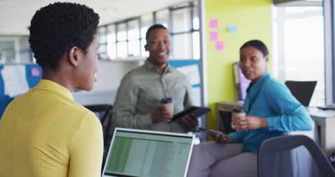 Collaborative Office Meeting with African American Professionals
