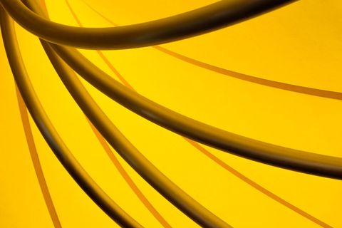 Abstract Yellow and Black Curved Lines on Bright Background