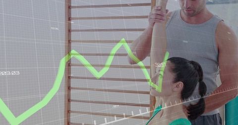 Instructor Assisting Client in Stretching with Digital Interface Overlay