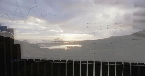 Coastal estuary viewing through reflective glass with railing and analytics overlay at sunset