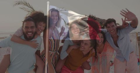 Diverse Friends Celebrating on Beach Sunset Piggybacking