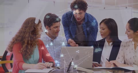 Diverse Team Analyzing Global Network Data on Laptop