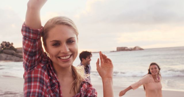 Group of Friends Enjoying Beach at Sunset - Download Free Stock Images Pikwizard.com