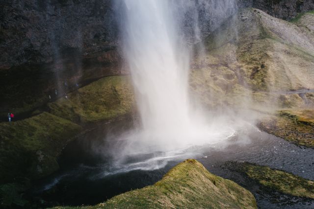 Powerful Waterfall Flows into Scenic Basin - Download Free Stock Photos Pikwizard.com