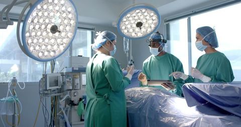 Team of Surgeons Collaborating in Modern Operating Room