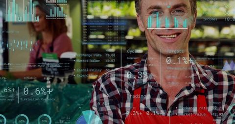 Smiling Male Grocery Clerk Wearing Red Apron and Plaid Shirt Surrounded by Retail Analytics