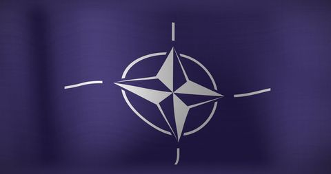 waving nato flag symbolizing unity and strength - Download Free Stock Images Pikwizard.com