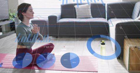 Woman practicing yoga and meditation on home mat tracking wellness with augmented health data