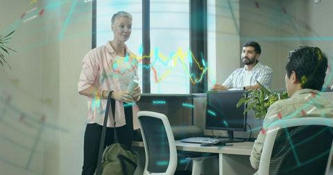 Team Collaborating in Modern Open Office with Digital Graph Overlay