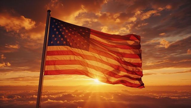 American Flag Waving in Glorious Sunset Above Clouds