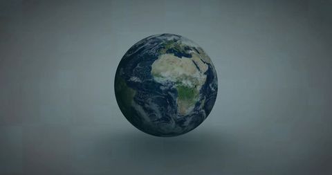 Realistic 3d earth globe with clouds against gray background