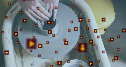 Caucasian Woman Practicing Pottery with Interactive Digital Overlay