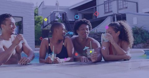 Group of friends having fun by backyard pool with cocktails