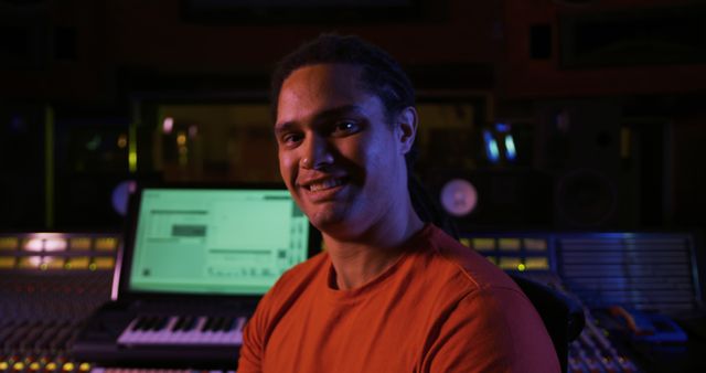 Smiling young man in recording studio - Download Free Stock Images Pikwizard.com