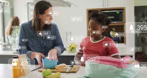 Mother and Daughter Cooking with Social Media Overlay