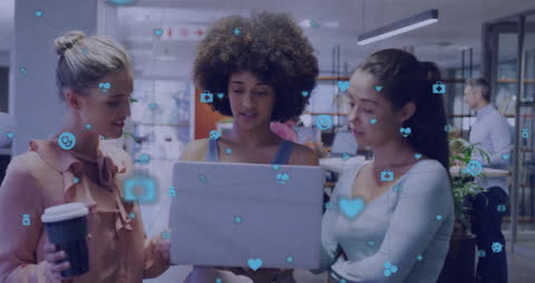 Diverse Team Engaging in Media Network Technology in Modern Office