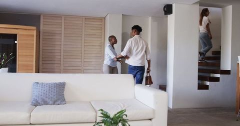 Modern Living Room Entrance with African American Woman