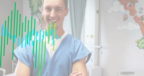 Smiling male healthcare worker wearing blue scrubs in pediatric clinic with data overlay