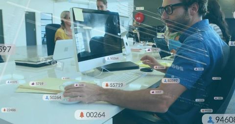 Man typing in office with social metrics overlay