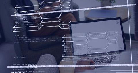 Woman typing on laptop trackpad in lounge with code overlay and interface reflection