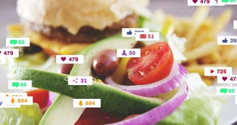 Fresh salad and burger with social media engagement icons overlay for food marketing