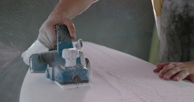 Craftsman Shaping Surfboard with Electric Planer - Download Free Stock Images Pikwizard.com