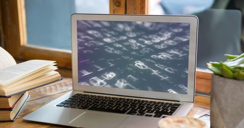 Laptop Displaying Binary Code in Modern Office Setting - Download Free Stock Images Pikwizard.com