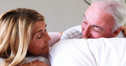 Happy Senior Couple Relaxing Together on Bed - Download Free Stock Images Pikwizard.com