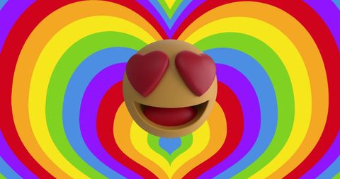 Heart eyes emoji on rainbow pride background