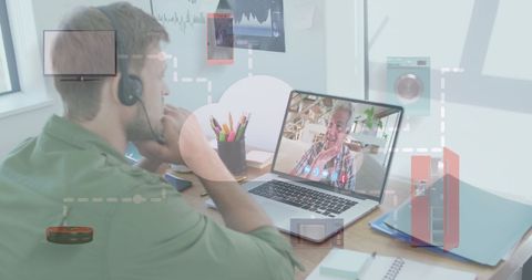 Man having video call with senior approaching digital screen
