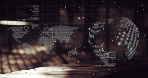 Dotted digital world map and holographic globe hovering above wooden tabletop