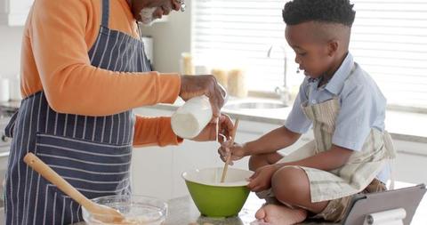 Grandfather and Grandson Cooking Together in Modern Kitchen - Download Free Stock Images Pikwizard.com