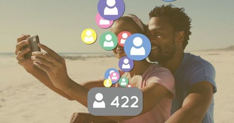 Couple Taking Selfie by Beach with Social Media Icons