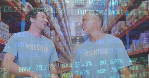 Volunteers High-Fiving in Warehouse with Stock Market Data Overlay - Download Free Stock Images Pikwizard.com