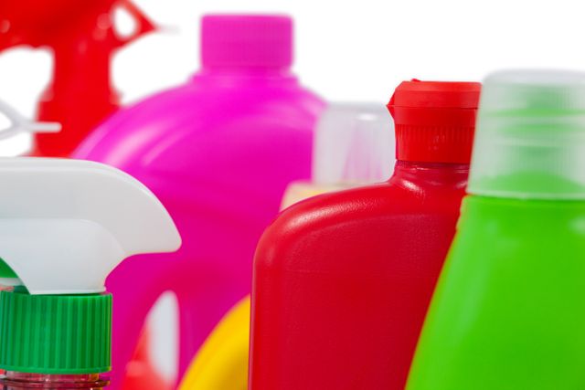 Various detergent containers arranged on white background - Download Free Stock Photos Pikwizard.com