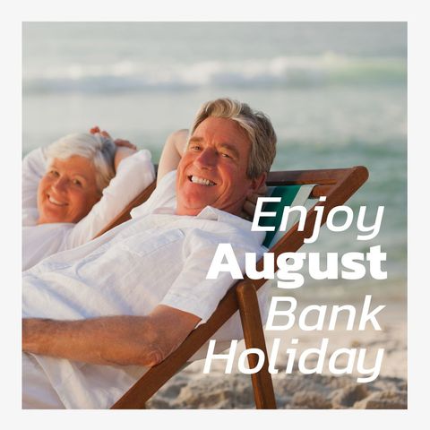 Senior couple relaxing on beach during august bank holiday