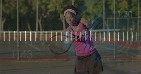 Determined Female Tennis Player in Action on Court