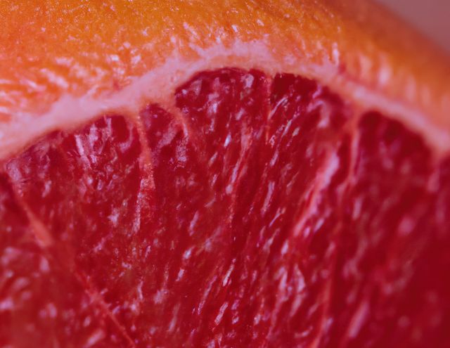 Close-Up of Juicy Grapefruit Slice - Download Free Stock Images Pikwizard.com